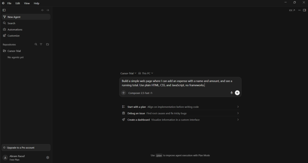 Cursor chat panel with the expense tracker prompt typed in before scaffolding the project